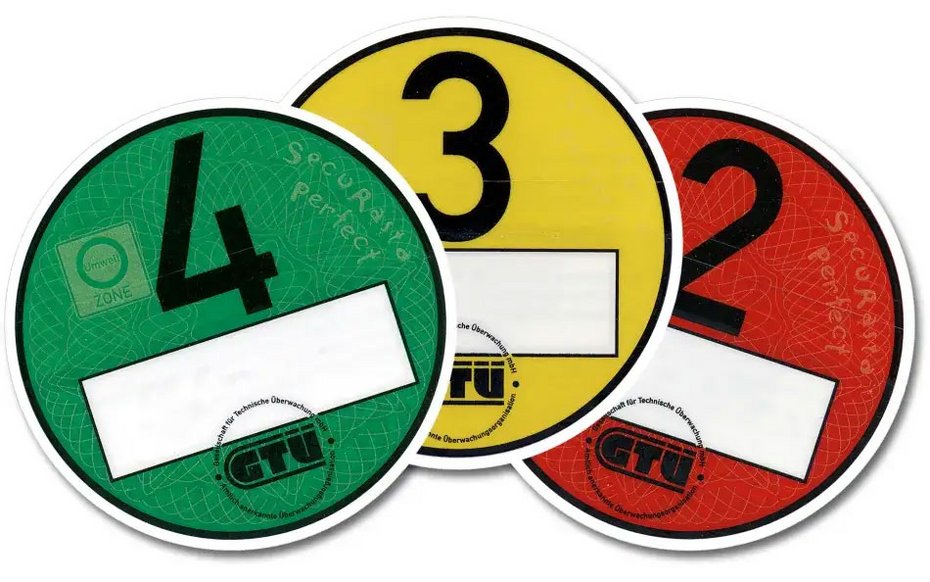 Feinstaubplaketten der GTÜ in Grün, Gelb und Rot – Umweltplaketten für Umweltzonen
