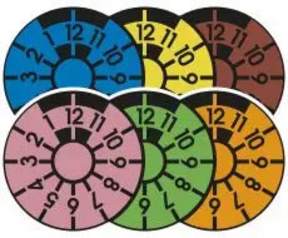 TÜV Plaketten in den gültigen Farben